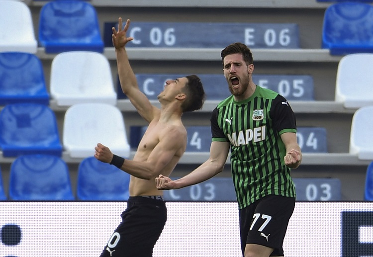 Filip Djuricic celebrates with Giorgos Kriakopoulos after scoring Sassuolo's second goal vs Hellas Verona in Serie A