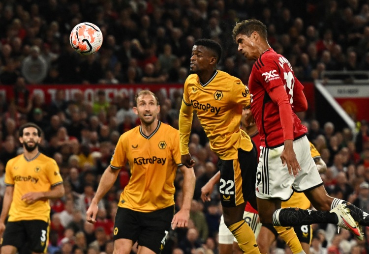 Raphael Varane heads home Man United's first goal of the Premier League season