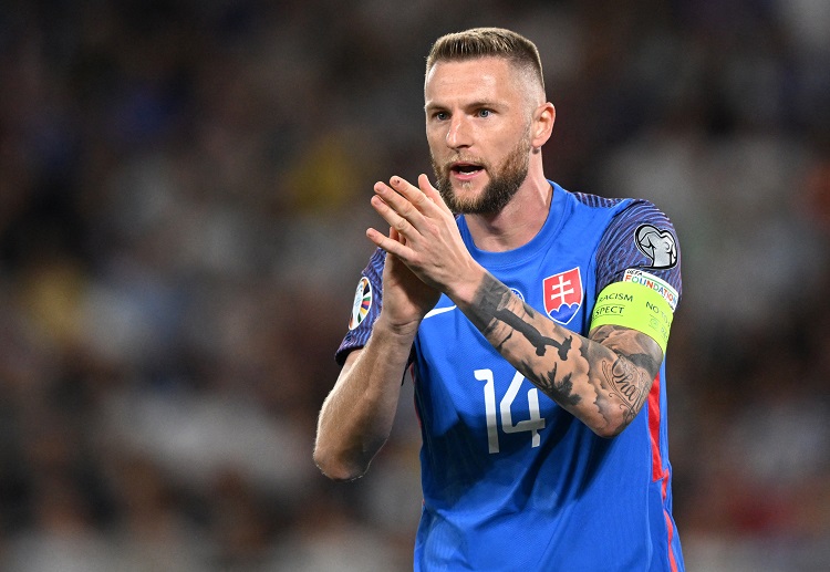 Slovakia defender Milan Skriniar applauds during the Euro 2024 qualifying against Portugal